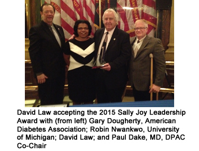 David Law accepting the 2015 Sally Joy Leadership Award with (from left) Gary Dougherty, American Diabetes Association; Robin Nwankwo; David Law; and Paul Dake, MD, DPAC Co-Chair