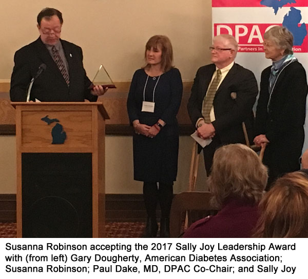 Susanna Robinson accepting the 2017 Sally Joy Leadership Award with (from left) Gary Dougherty, American Diabetes Association; Susanna Robinson; Paul Dake, MD, DPAC Co-Chair; and Sally Joy