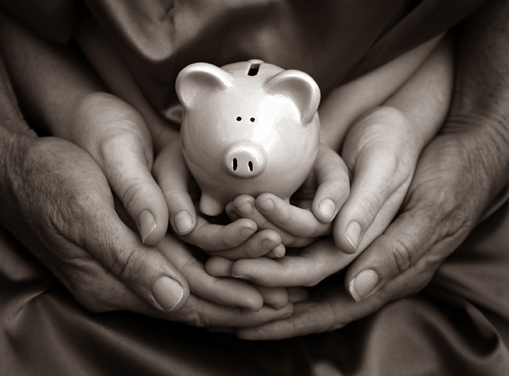 holding a piggy bank